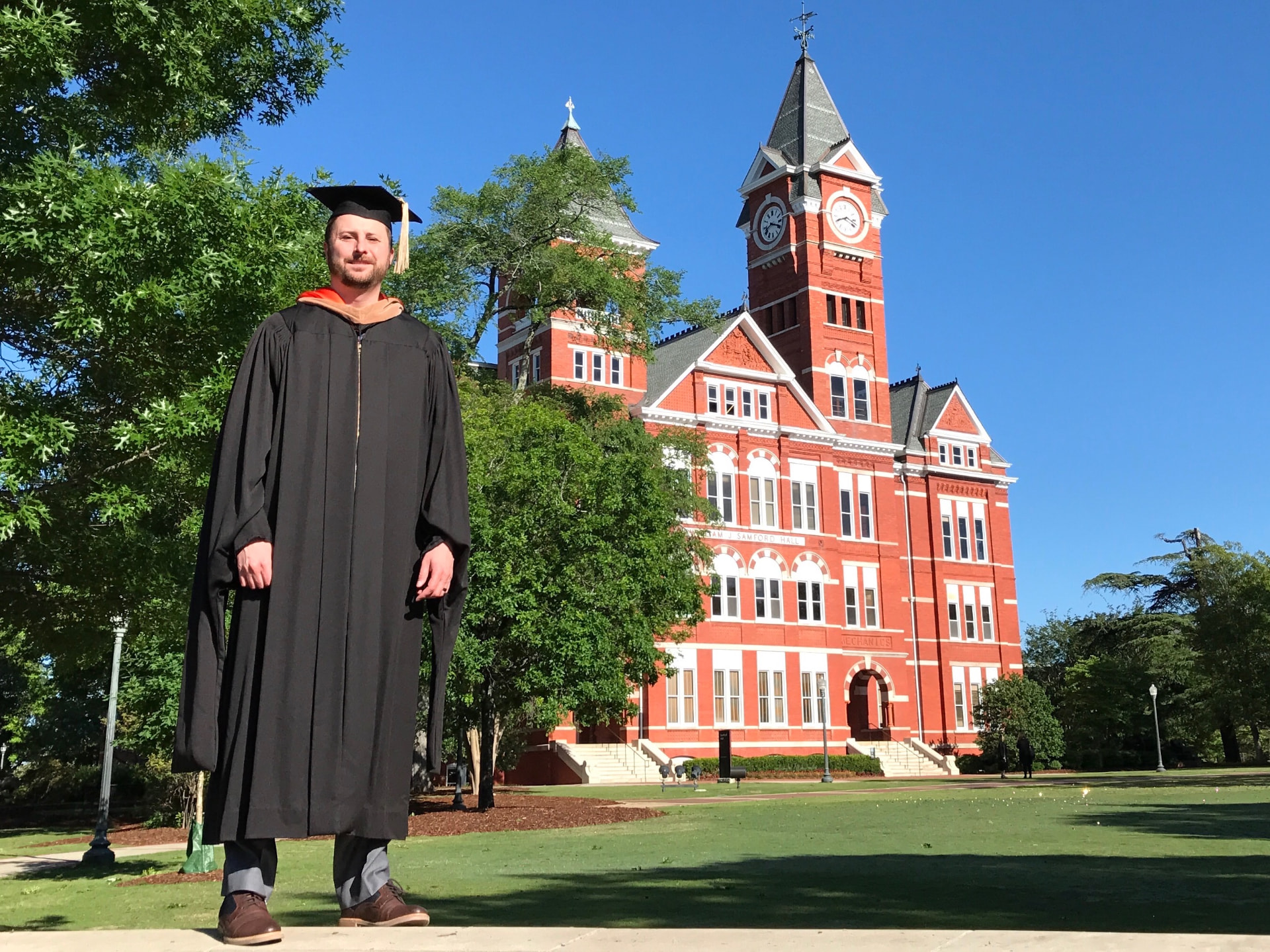 Steve Tafoya at graduation in front of Samford Hall, Auburn University