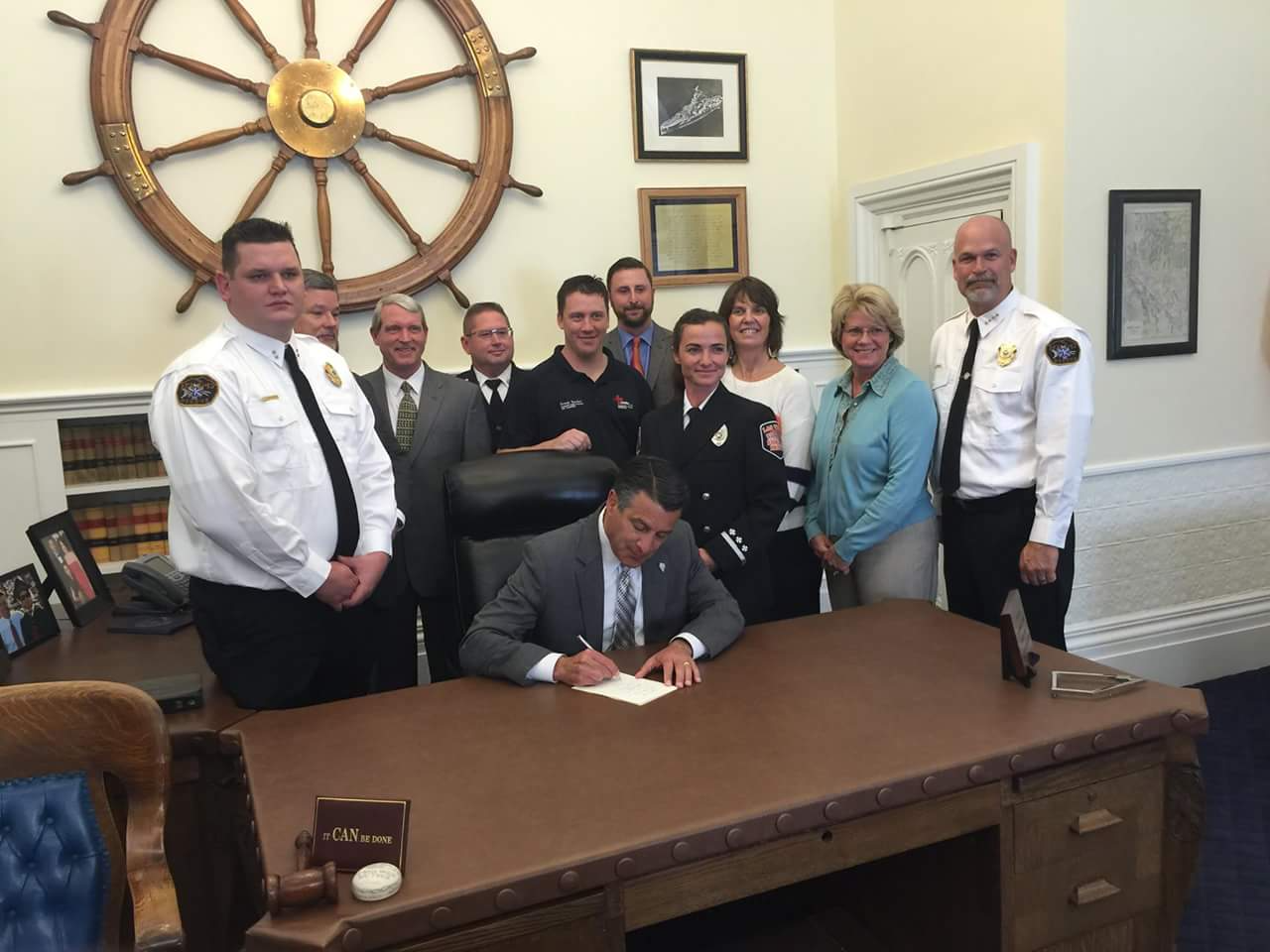 Steve Tafoya with Nevada healthcare leaders at a governor's bill signing